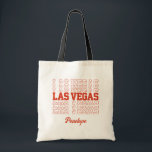 Las Vegas Bachelorette Bridesmaid Bolsa<br><div class="desc">Prepare-se para uma experiência memorável de casamento em Las Vegas com este saco de tote de boas-vindas personalizável a cores! É o bolsa de presente perfeito que os hóspedes vão querer guardar. Esta bolsa elegante e prática mostra as palavras "Las Vegas" junto com seus nomes e data. A cor é...</div>