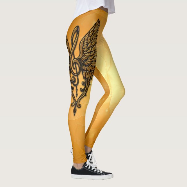 Legging A alma da melodia, uma clave ouro com asas. (Direita)