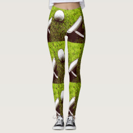 Legging Bola de golfe e bota sobre grama verde