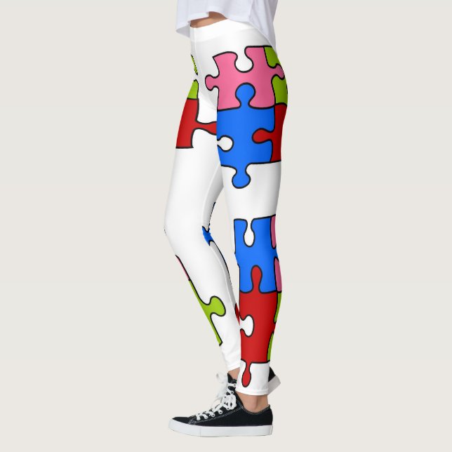 Legging Caneleiras do quebra-cabeça de serra de vaivém (Esquerda)