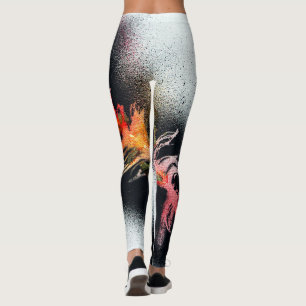 Legging Caneleiras pretas e alaranjadas clássicas da pena