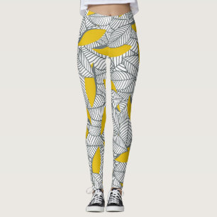 Legging Cinza e folha amarela.