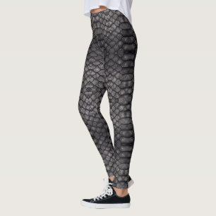 Legging Design de pele de réptil preto em uma perna