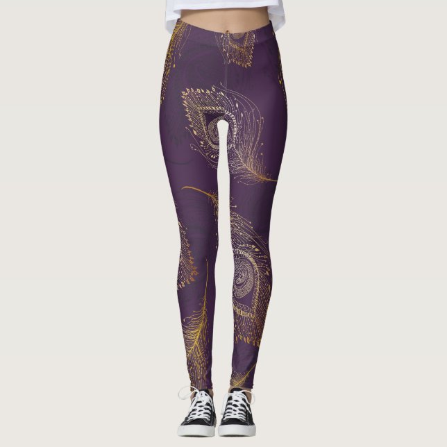 Legging Dourada pena de pavão, fundo violeta. (Frente)