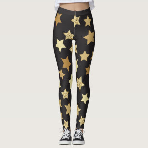 Legging Estrelas douradas no teste padrão preto do fundo