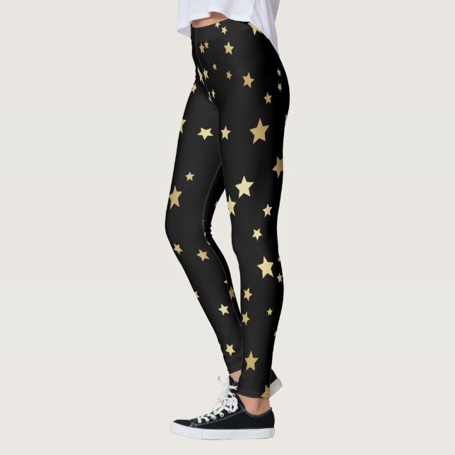 Legging Estrelas Dourados no fundo preto (Esquerda)