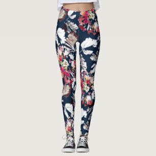 Legging Flores brancas e vermelhas em azul.