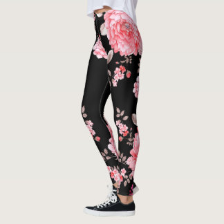 Legging Flores cor-de-rosa com legenda preta de fundo.