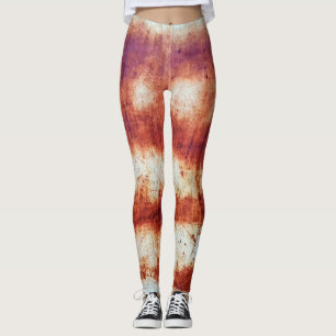 Legging metal enferrujado, fundo texturizado.