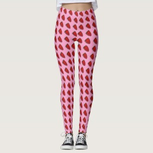Legging Morangos vermelhas em caneleiras cor-de-rosa