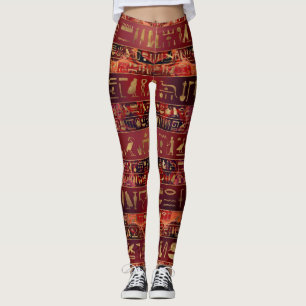 Legging Ouro egípcio dos hieroglyphs na textura pintada