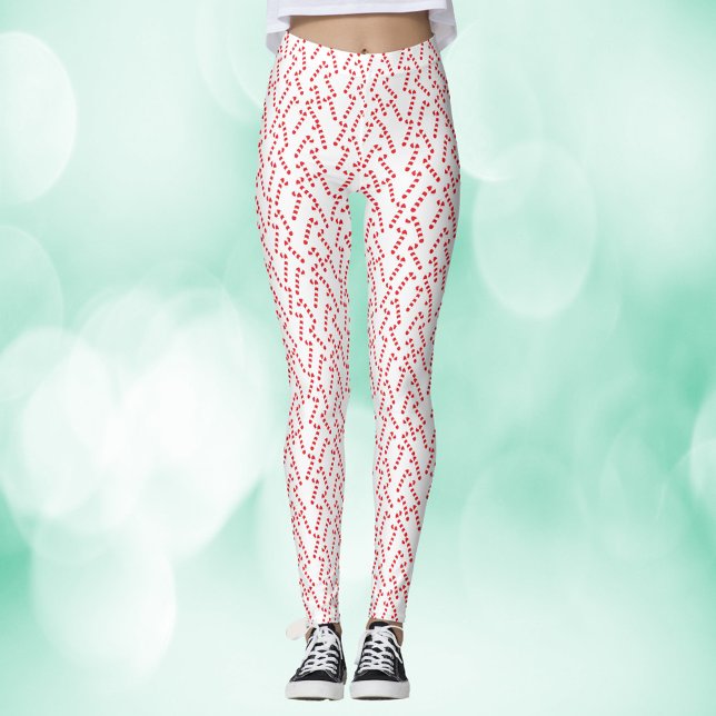 Legging Padrão Branco Candy Cane Red (A pair of leggings with a red and white candy cane pattern)