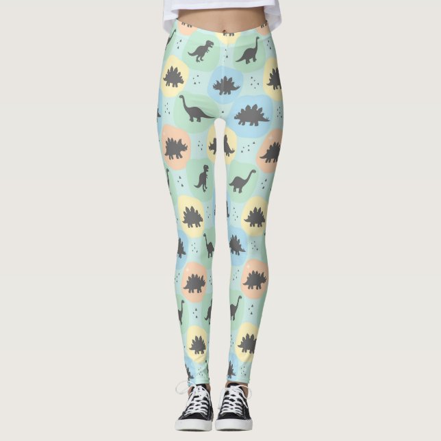 Legging Padrão contínuo de silhueta de dinossauro pré-hist (Frente)