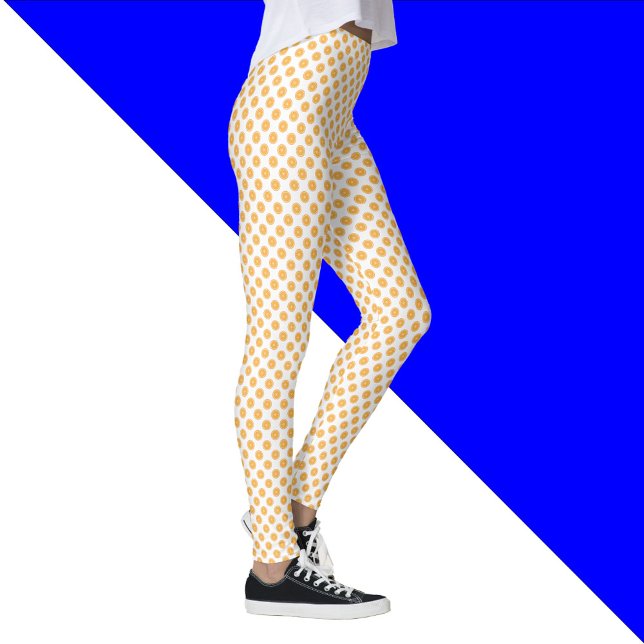Legging Padrão de Fruta laranja (A pair of leggings with an orange fruit pattern)