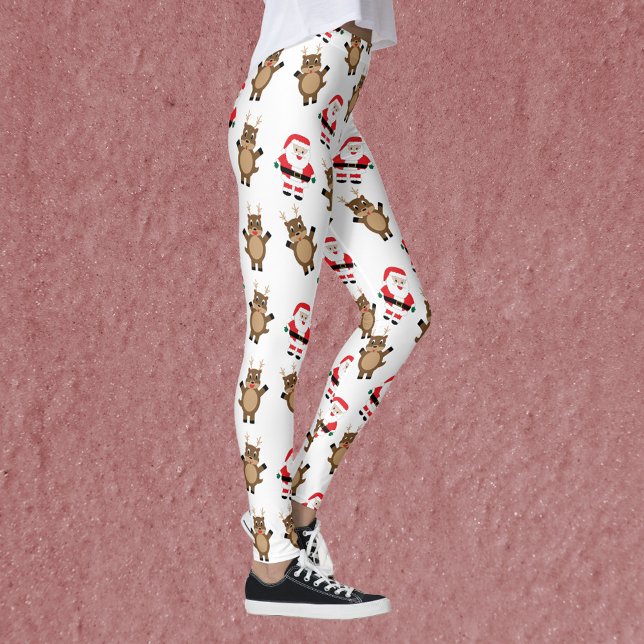 Legging Padrão de Natal da Rena Vermelha Santa Claus (A pair of leggings featuring a pattern of Santa in a red suit and reindeer.)