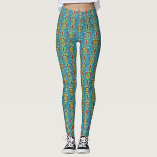 Legging Padrão girado com pontas de abstrato no fundo azul