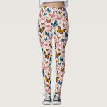 Legging Padrão Girly Butterfly<br><div class="desc">Leggings de padrão de borboletas femininas e brancas,  mostrando uma ilustração de borboletas cor-de-rosa,  amarelas e azuis sobre um fundo rosa. Há também folhas verdes.</div>