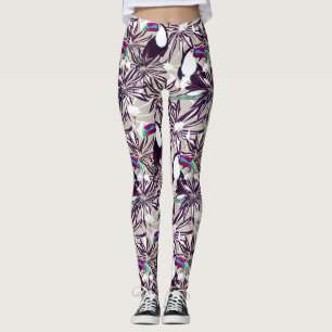 Legging Padrão tropical com palmeiras e aves.