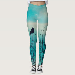 Legging Pequeno Pássaro Negra E Um Céu Azul Mole