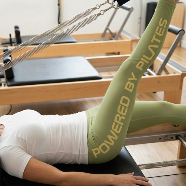 Legging Pilates Monogram Create Your Own Design Olive (Olive green Pilates leggings worn by a woman on a reformer)