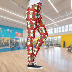 Legging Pinguim de Natal andando na neve