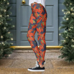 Legging Poinsettia Christmas<br><div class="desc">Padrão de poinsettia com cor de fundo personalizada. Eles seriam excelentes de adicionar ao seu conjunto de suéter feio. Conclua o olhar com alguns brincos de árvore de natal :)</div>