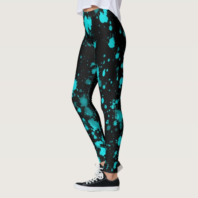 Legging Pulseiras de Tinta Azul nas Pernas Pretas (Esquerda)