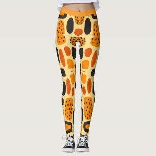 Legging "Savanna Pop: Tribal Vibes em Laranja e Negro"