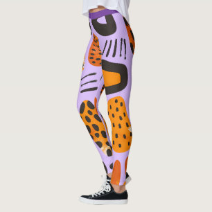 Legging "Savanna Pop: Tribal Vibes em Laranja e Negro"