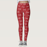 Legging Snowflake Airplane on red.<br><div class="desc">Lots of beautiful snowflakes cluster together to from an airliner on red with more red snowflakes.</div>