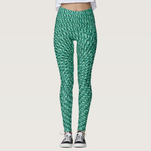 Legging Textura artificial de tecido verde trançada.