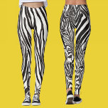 Legging Tiras de Zebra Negra e Branca de Artsy Moderna<br><div class="desc">Abstrato preto-e-branco moderno com um padrão minimalista de stripes de zebra africanas. No verso você pode ver alguns olhos para que você possa supor que há uma zebra escondida. Legal para esportes,  corridas,  corridas,  ioga ou apenas para visto diário. Peça o seu hoje!</div>