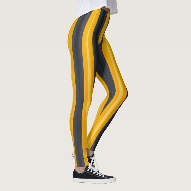 Legging Triângulos Coloridos (Abstract geometric pattern with vertical stripes in shades of yellow and gray.)