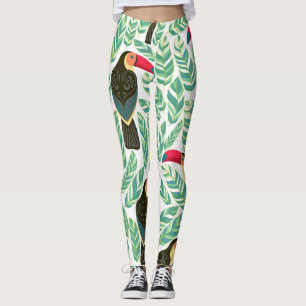 Legging Tucanos, folhas tropicais, padrão decorativo.