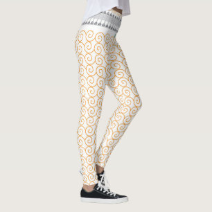 Legging um fundo laranja e branco com espirais