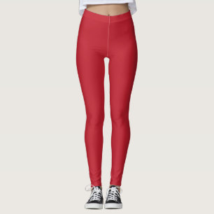 Legging um fundo vermelho com uma