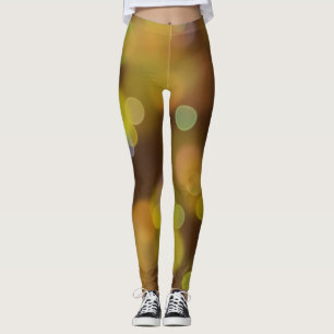 Legging Um padrão de Natal Dourado em Marrom Claro