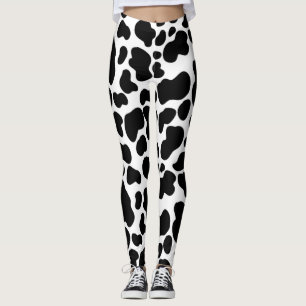 Legging Vaca branca e negra escondida como padrão