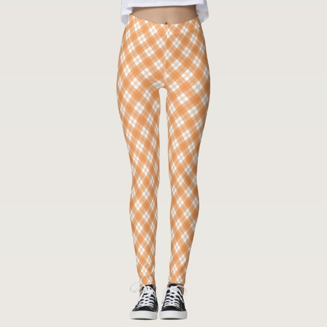 Leggings xadrez bege e branco exibidas  (Frente)