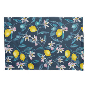 Lemon branches with blossoms and fruit on blue