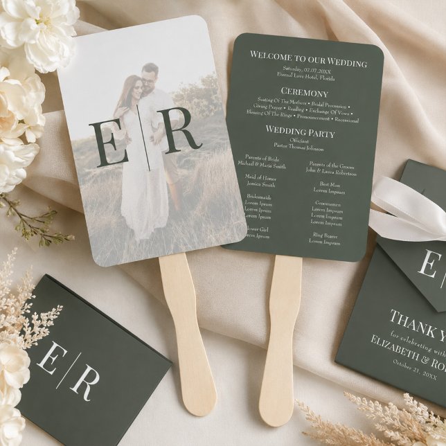 Leque de mão para programa de casamento com monogr (Dark Olive Monogram Wedding Program Hand Fan on a table with wedding decor and flowers)