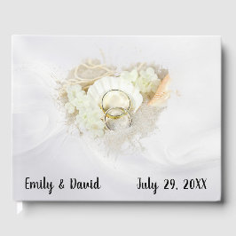 Livro De Visitas Wedding Rings in Seashell On White Satin