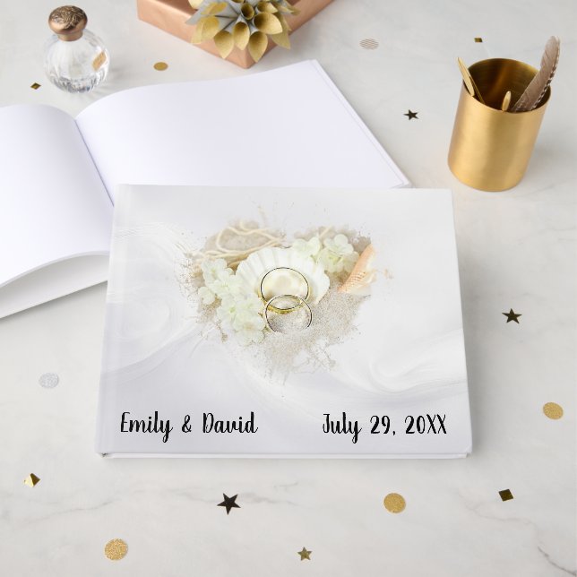 Livro De Visitas Wedding Rings in Seashell On White Satin (Frente aberta)