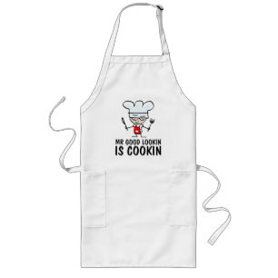 Longo O Sr. bonito está cozinhando o avental para homen