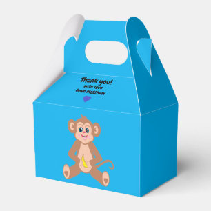 Macaco em uma caixa de favorecimento de fundo azul