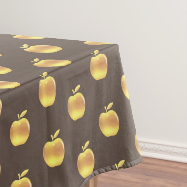 Maçãs douradas em toalha de mesa marrom (Posição Original)