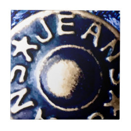Macro de um botão de jeans de bronze
