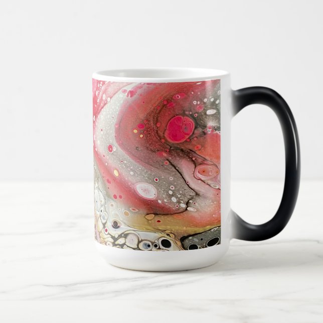 Mágica Uma caneca com cor rosa, dourada e preta (Direita)