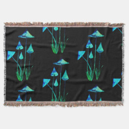 Manta Cogumelos que incandescem na cobertura escura de