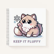 Mantenha-o Fluffy kitten no notebook